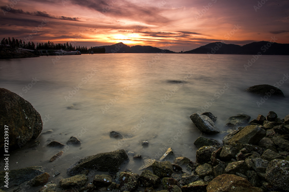 scenery of sunset at Lumut,Perak,Malaysia.Soft focus.motion blur due to long exposure scenery of sunset at Lumut,Perak,Malaysia.Soft focus.motion blur due to long exposure