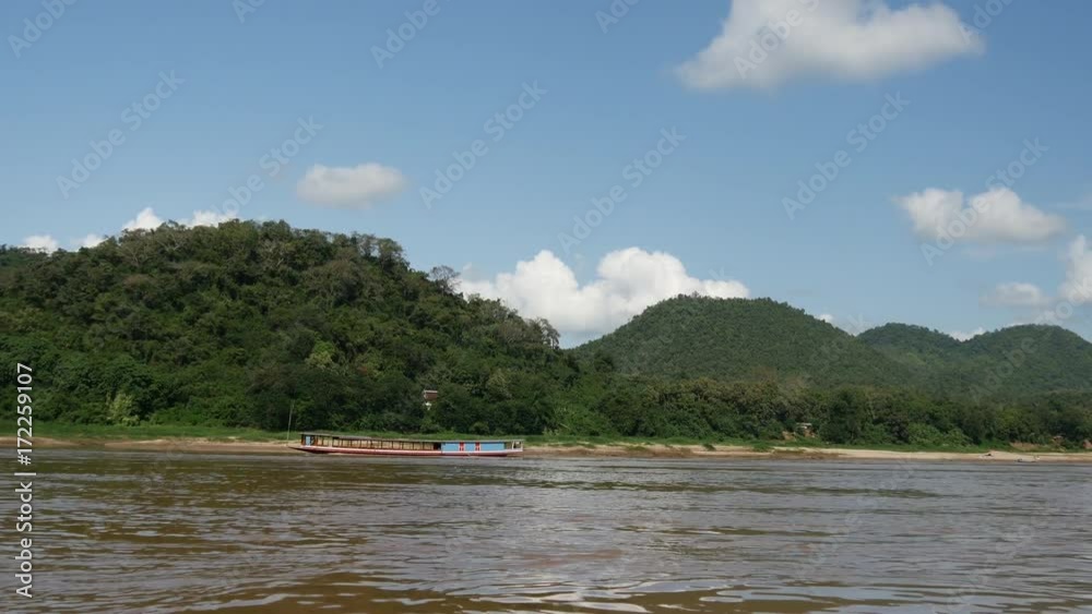 With a boat at the mekong river landscape, Laos With a boat at the mekong river landscape, Laos