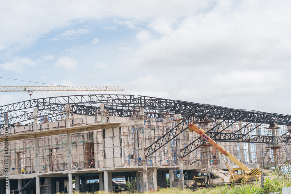 Construction site with crane and building