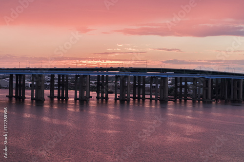 View of the sunset behind a bridge in Pert Amboy, New Jersey. © Maxi Sáez