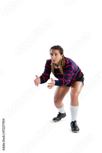 Female rugby player in catching position