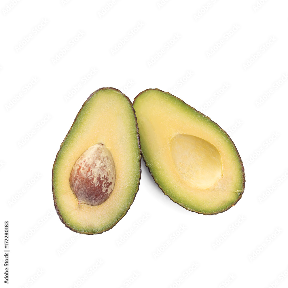 Two slices of avocado isolated on the white background. One slice with core.