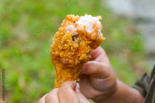 kids holding crispy friend chicken