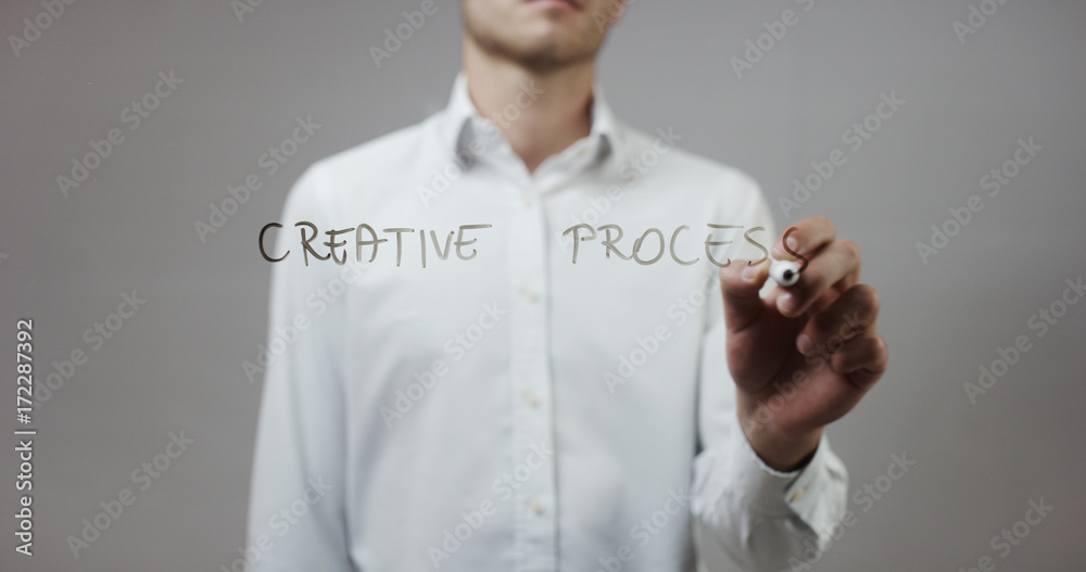 Creative process, Man Writing on Glass