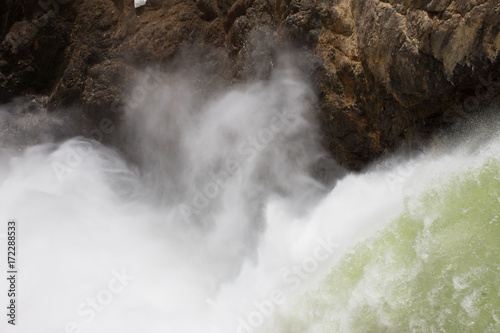 Close Up of the Brink of the Lower Falls of the Yellowstone River in Yellowstone National Park. Photographed from above.