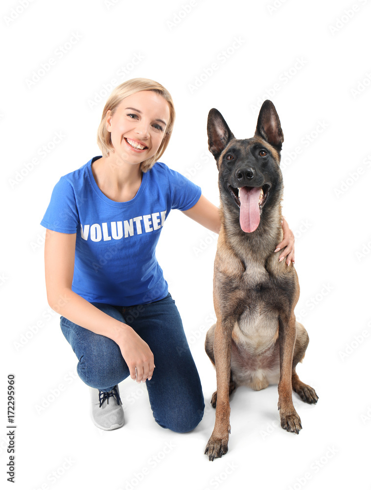 © Africa Studio - Young female volunteer with dog, isolated on white. Concept of volunteering and animal shelters © Africa Studio - Young female volunteer with dog, isolated on white. Concept of volunteering and animal shelters