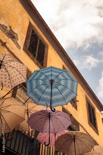 FUNCHAL, MADEIRA, PORTUGAL - SEPTEMBER 10, 2017: umbrella on a street in the historic city center