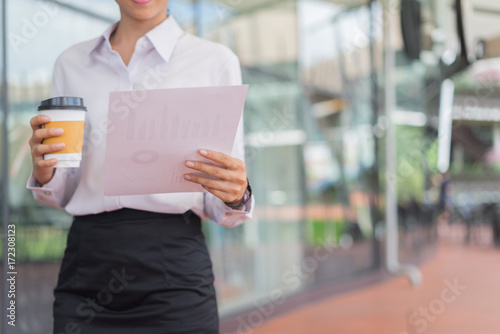 modern business woman look at document for working © I Believe I Can Fly
