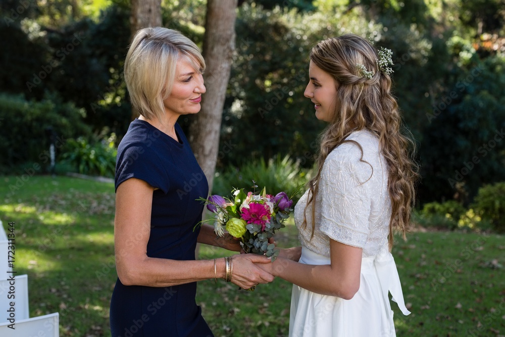Woman interacting with bride Woman interacting with bride