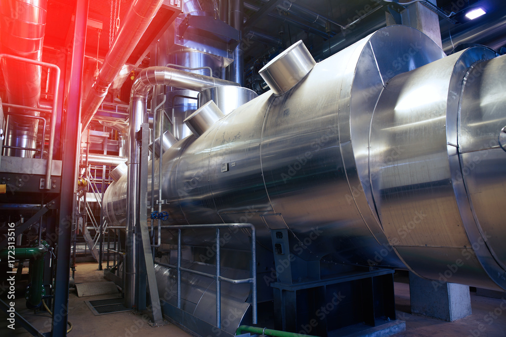 Fototapeta premium Equipment, cables and piping as found inside of a modern industrial power plant