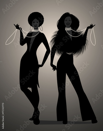 Silhouettes of two girls dancing soul, funky or disco music style