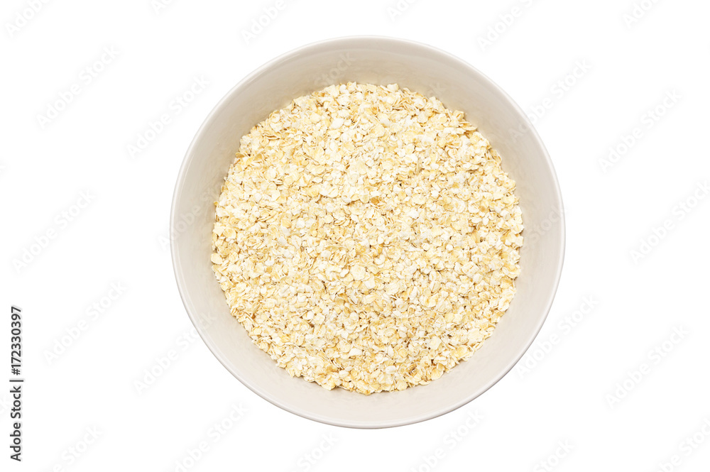 Oat in a bowl on a white background. Oat in a bowl on a white background.
