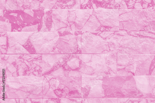 Pink stone brick wall for background.