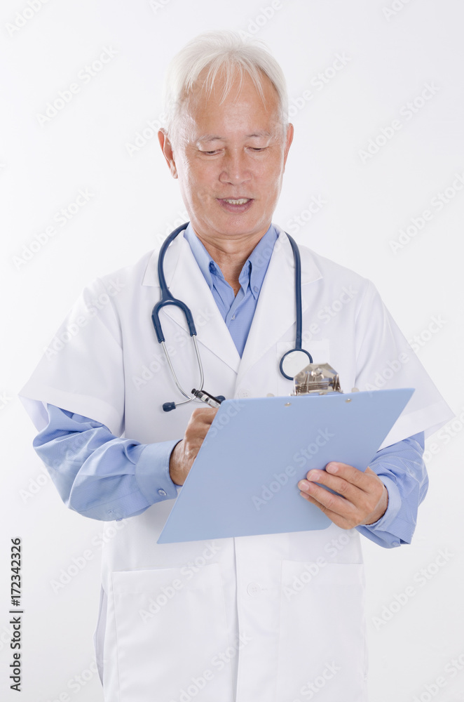 Asian medical doctor writing report Asian medical doctor writing report