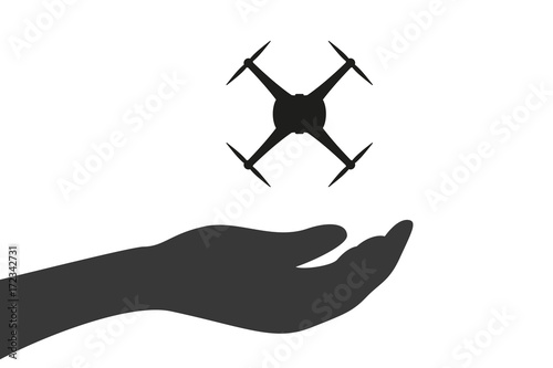 Hand hält Drohne - Kamera