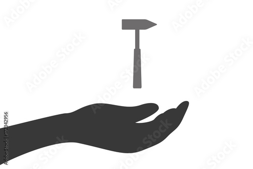 Hand hält Hammer
