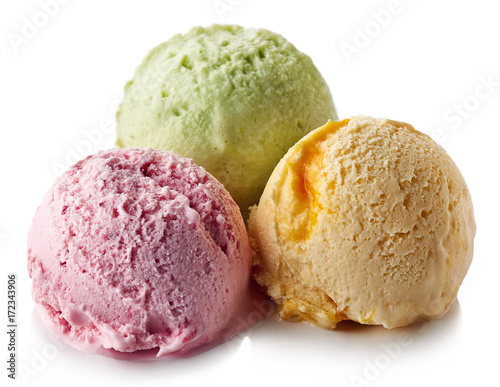Three various ice cream balls - strawberry, mango and mint