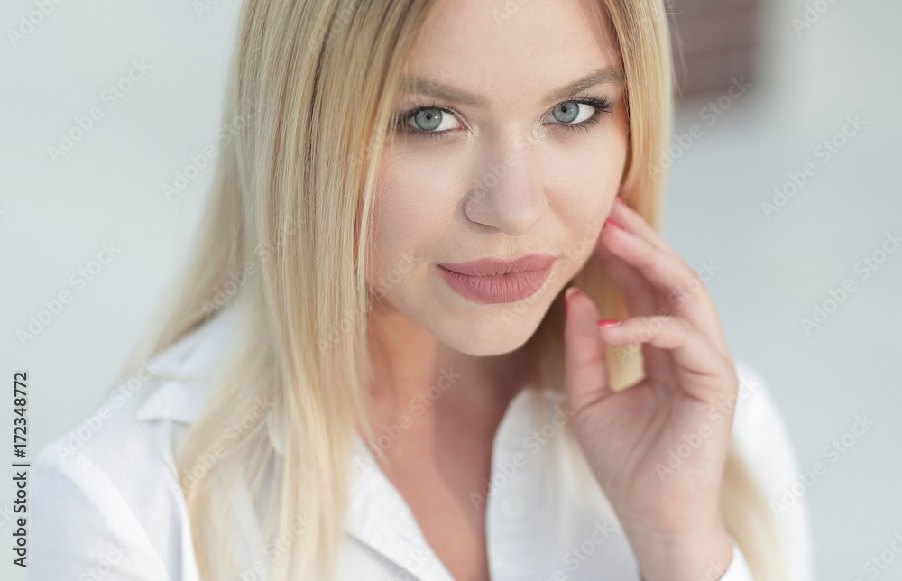 closeup face of a beautiful young woman closeup face of a beautiful young woman