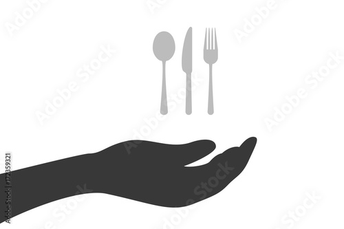 Hand hält Besteck