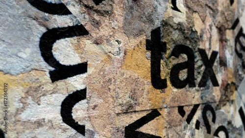 Tax tag on grunge background photo