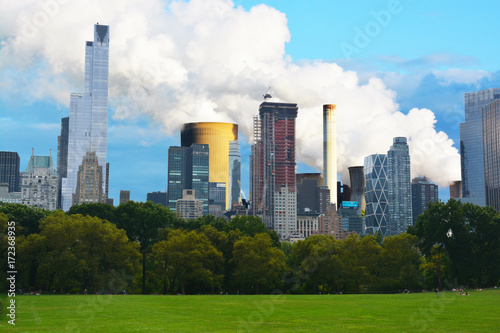 Pollution problems in urban area – New York City landscape with emissions in background