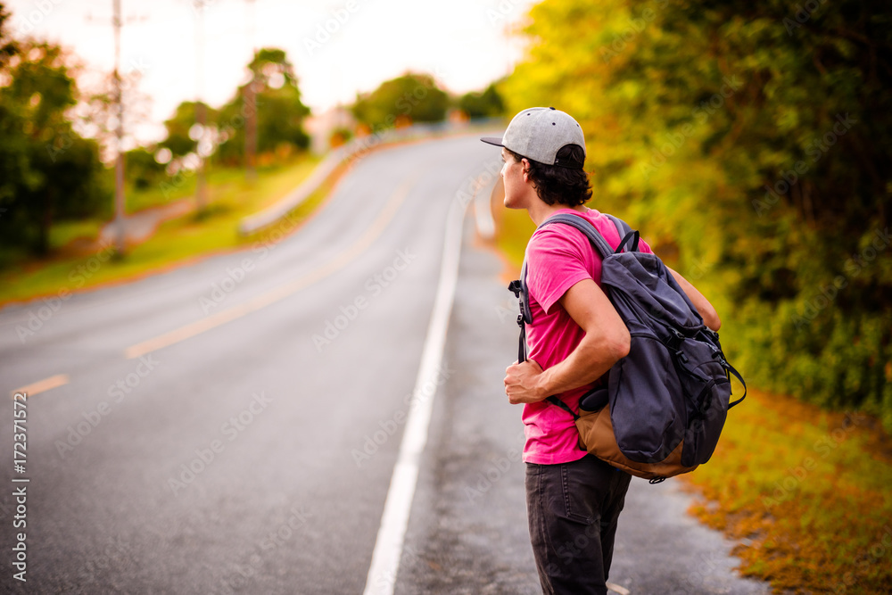 man traveler traveling walking with backpack at the jungle on holiday at weekend on background nature view man traveler traveling walking with backpack at the jungle on holiday at weekend on background nature view