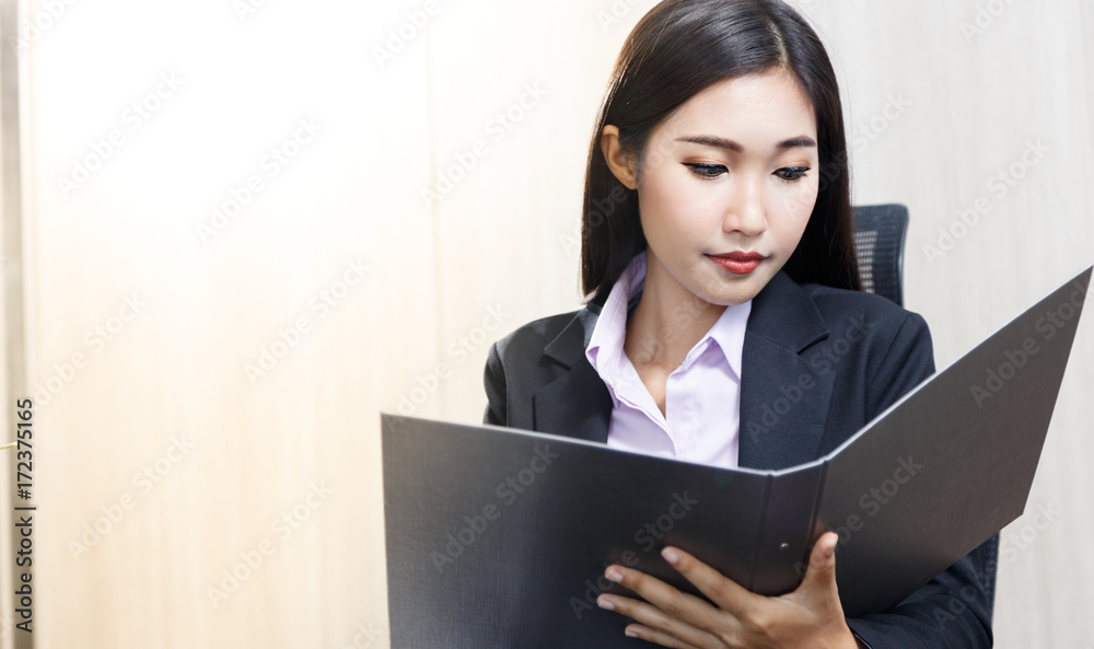Businesswoman working in office Businesswoman working in office