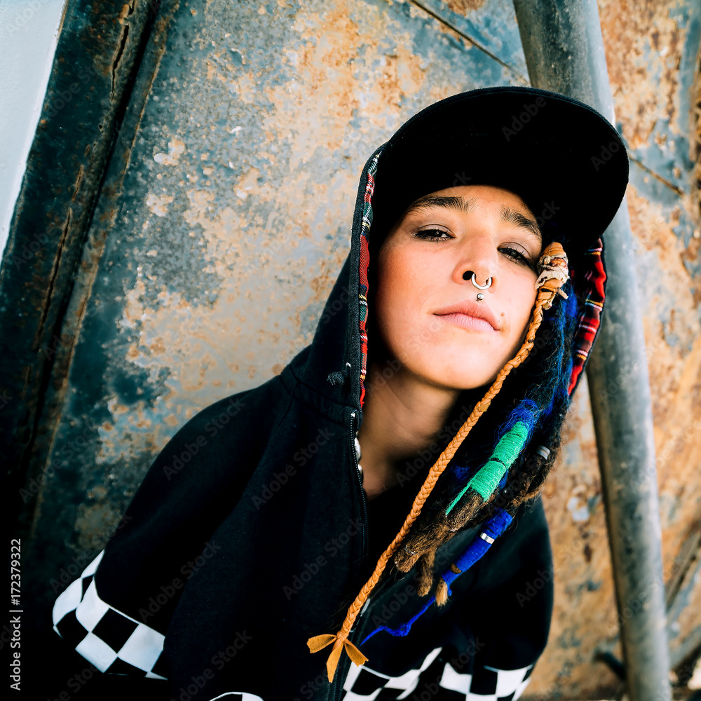 Foto Stock Young girl rap hip hop style. Urban Street Fashion | Adobe Stock