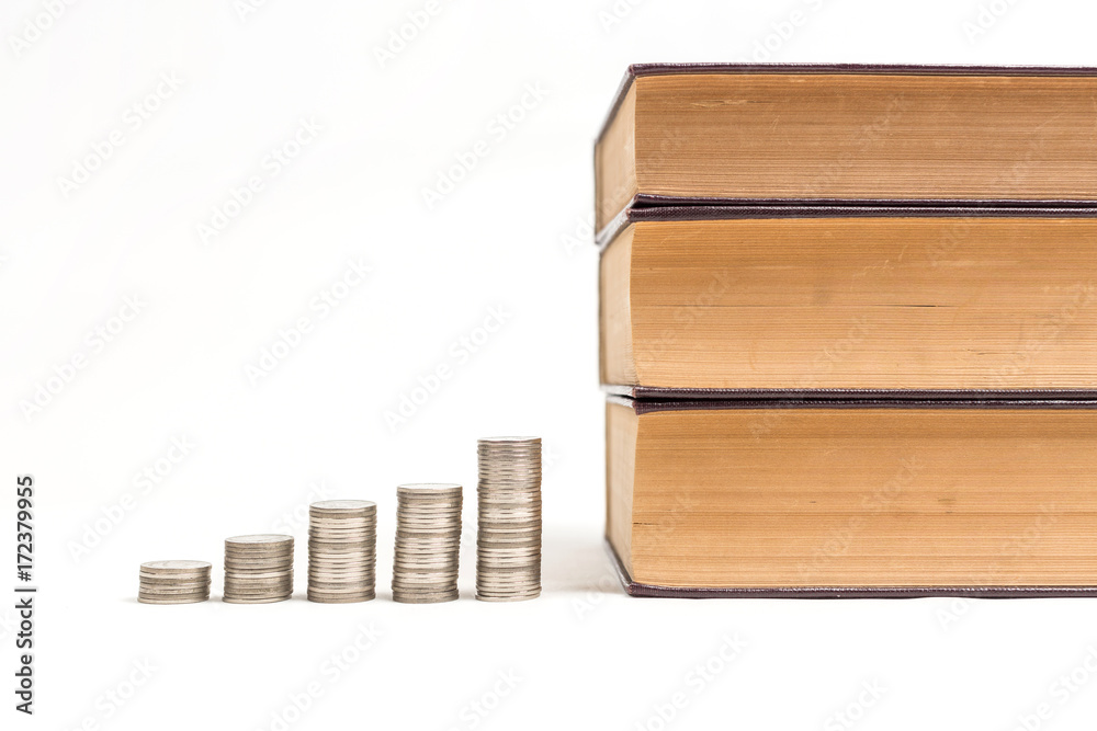 Books with coin collection for study loan concept. Books with coin collection for study loan concept.