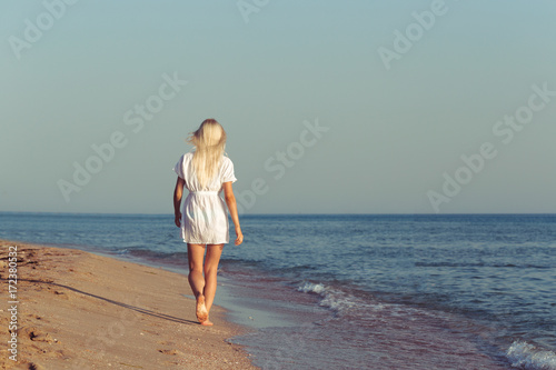 Young woman relaxing on the beach © fotofabrika