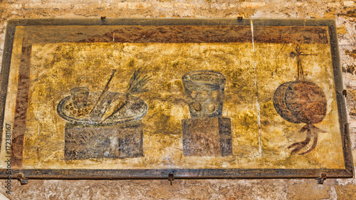 Interior of the Caseggiato del Termopolio : Decorative still life fresco - Ostia Antica - Rome , Italy