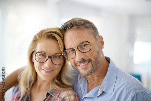 Portrait of mature couple wearing eyeglasses