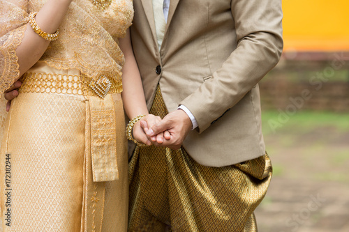 Couple wedding thai culture male and female suit