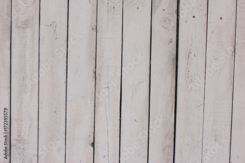 The light grey wooden texture background