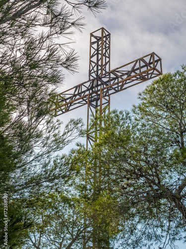 The metal cross Cruz de la Muela, Orihuela, Spain photo