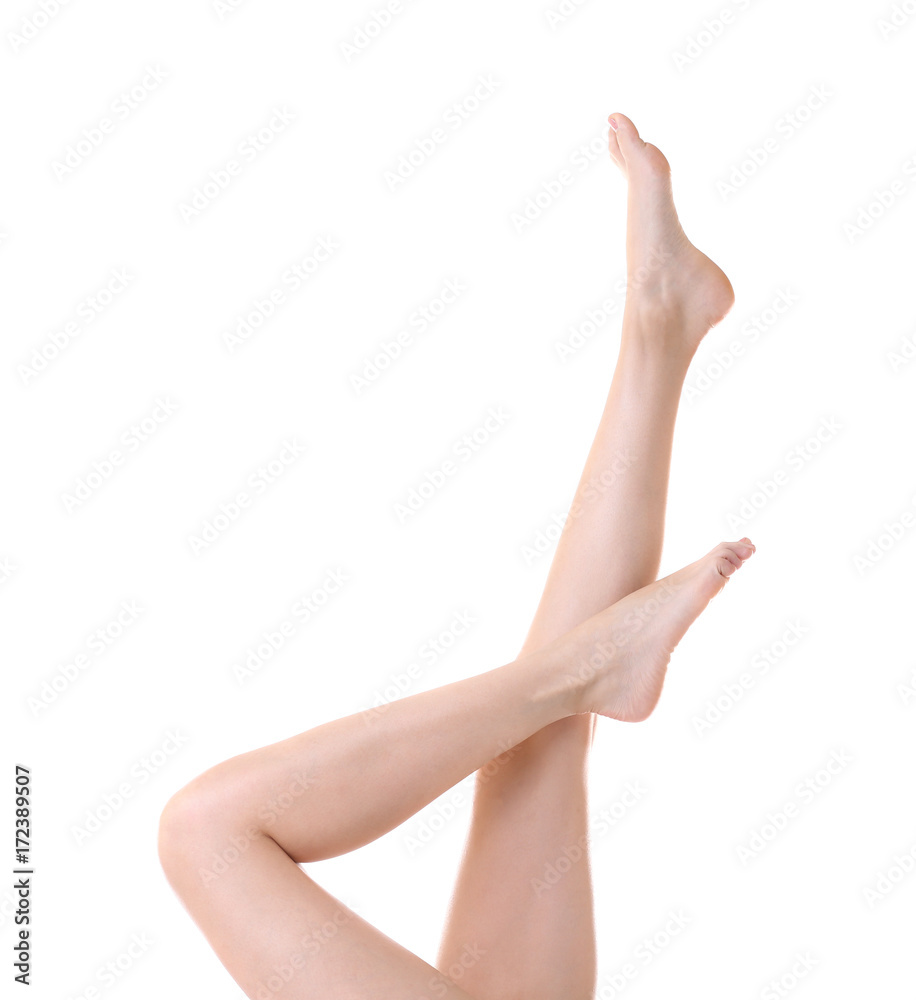 Beautiful female legs on white background Beautiful female legs on white background