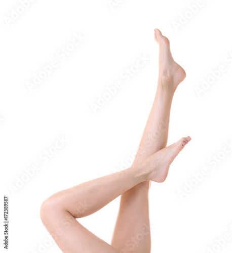Beautiful female legs on white background