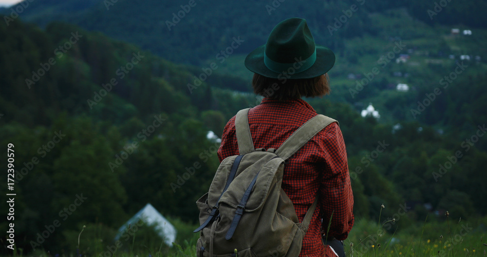 young tourist girl with backpack