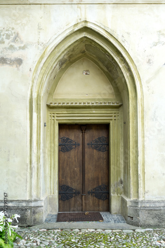 Arched door in an old stone building