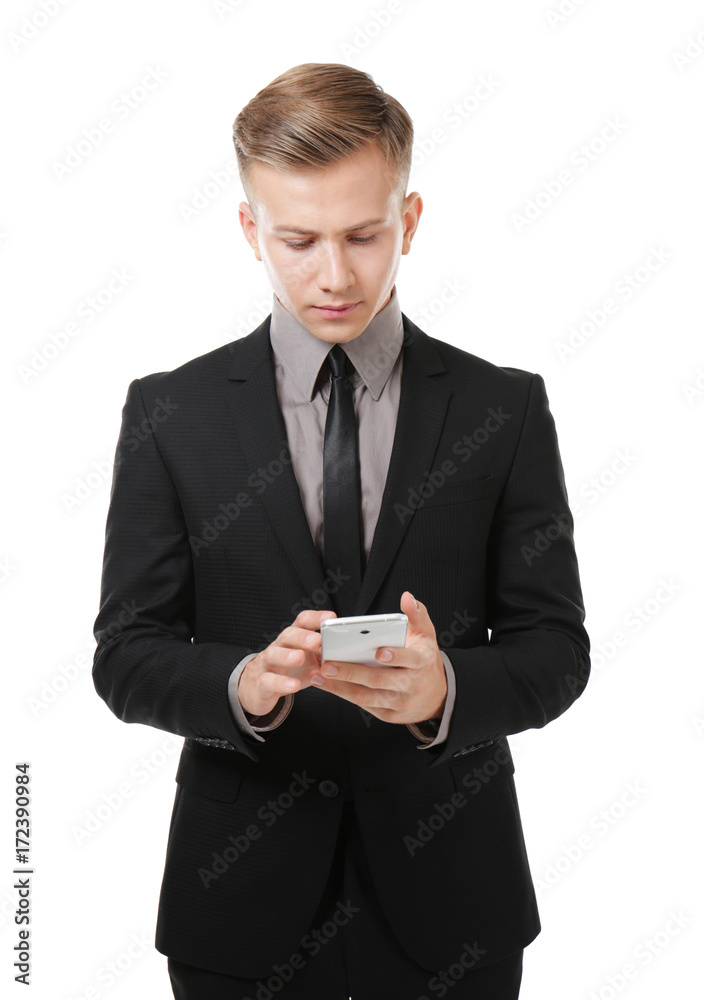 Young businessman with phone on white background Young businessman with phone on white background