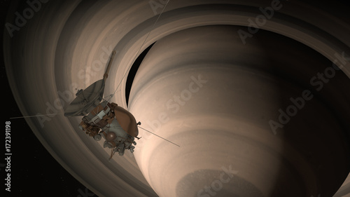 Satellite Cassini is approaching Saturn. Cassini Huygens is an unmanned spacecraft sent to the planet Saturn. CG animation. Elements of this photo furnished by NASA.