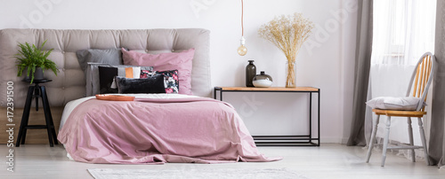 Charming, pastel pink bedcover photo