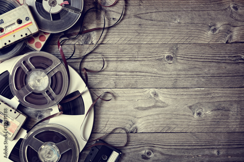 Canvas-taulu Old audio reels and cassette tape background