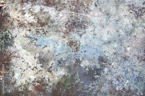 Metal background with rust and traces of paint and oxide, texture of titanium, sheet of metal surface, black and grey steel