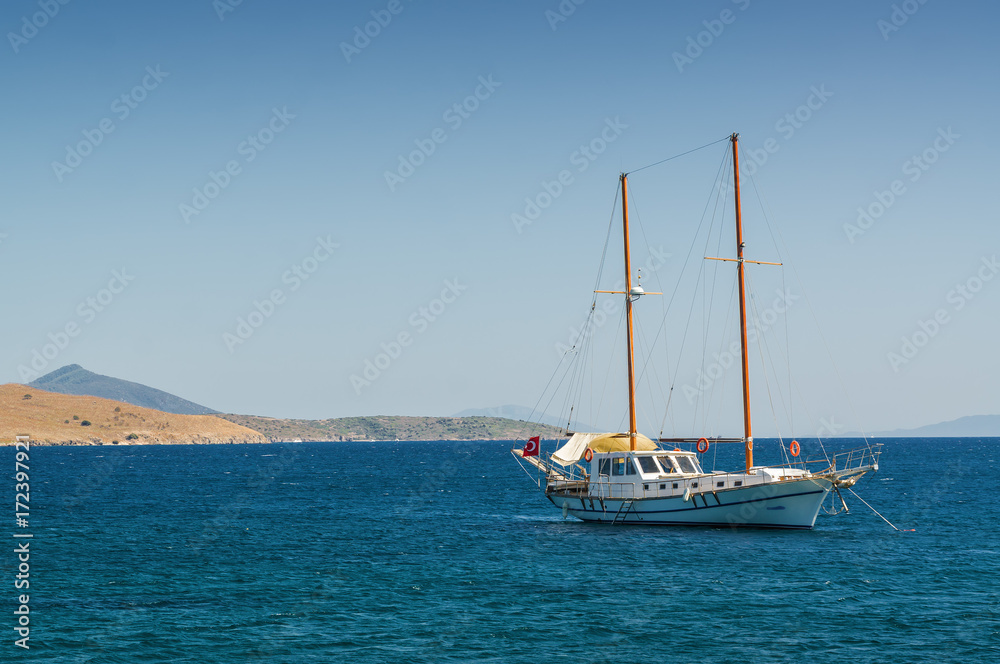 Sunny view of boats at Ortakent near Bodrum, Mugla, Turkey.