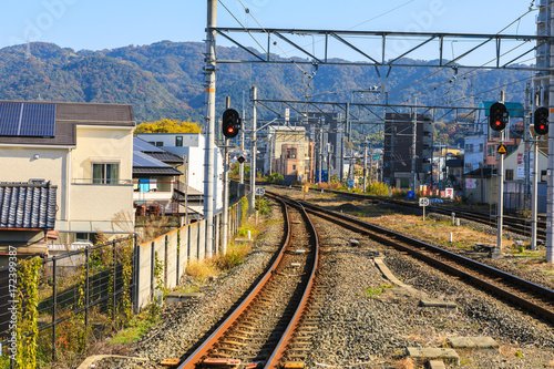 Train track at Uji Station with Mountain Backgroud.
