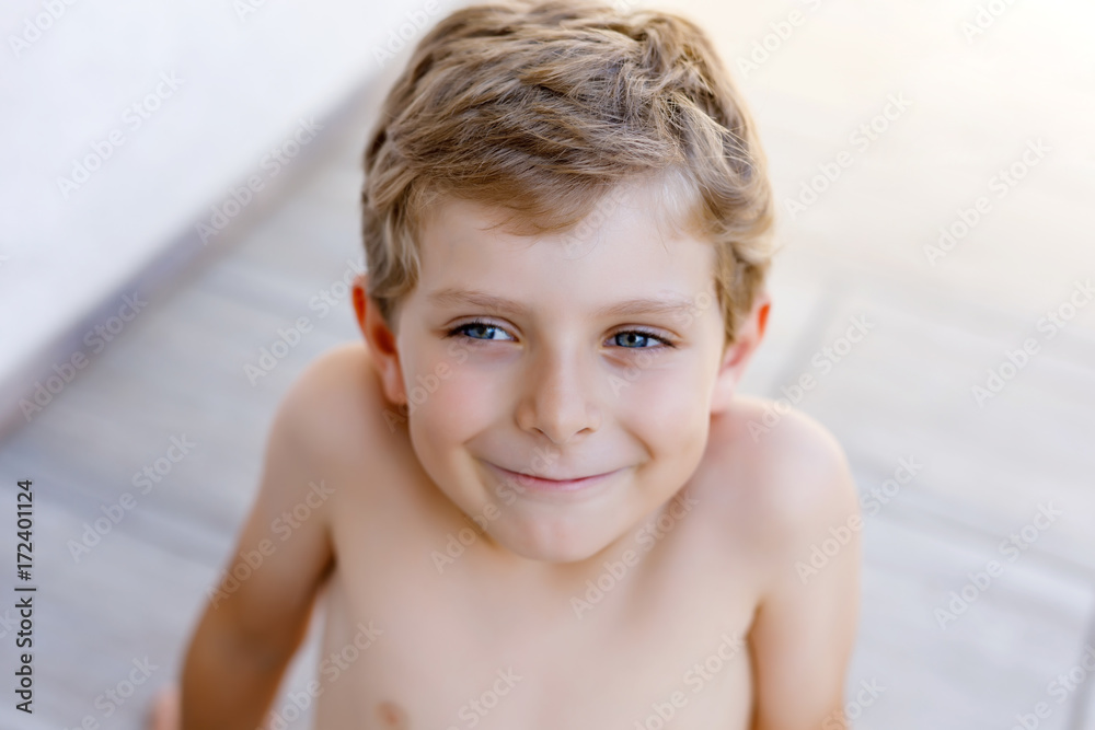 Beautiful Smiling Little Boy Portrait on warm sunny summer day Beautiful Smiling Little Boy Portrait on warm sunny summer day