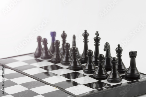 Chess photographed on a chess board isolated white background
