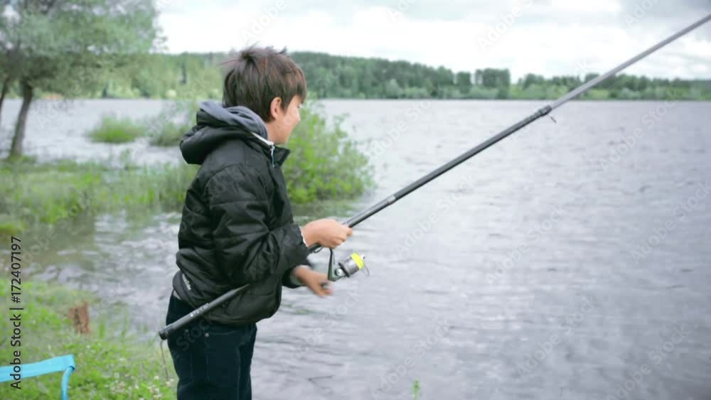 Children on fishing. Rest on the lake Children on fishing. Rest on the lake