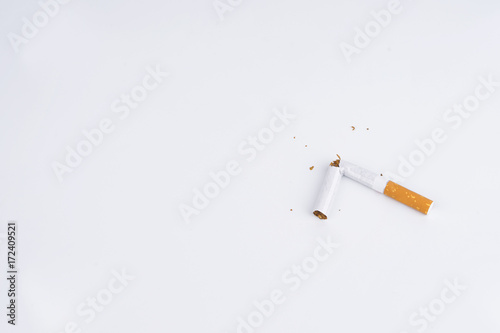 Concept World No Tobacco Day, and a Cigarette Damaged with Isolated White Background